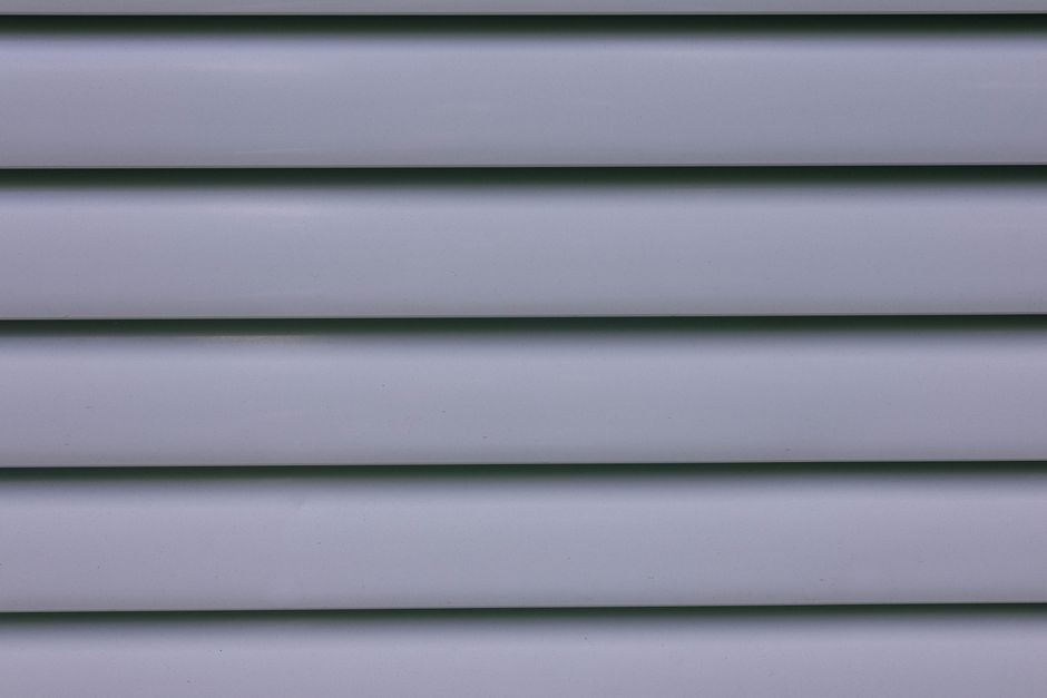 Newly installed vinyl house siding on a residential home